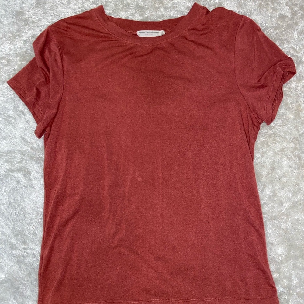 red/orange shirt